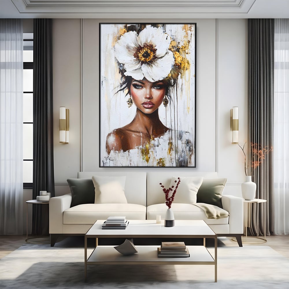 Tablou canvas cu tablou canvas cu portret feminin si floare, in rama de aluminiu negru, pe perete intr-un living